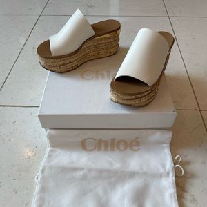 Chloe size 37 white leather wedge with gold trim at heel